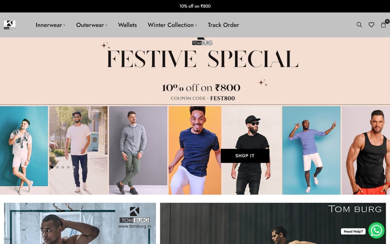 The Tom Burg storefront, showing the festive campaign banner above the menswear catalogue